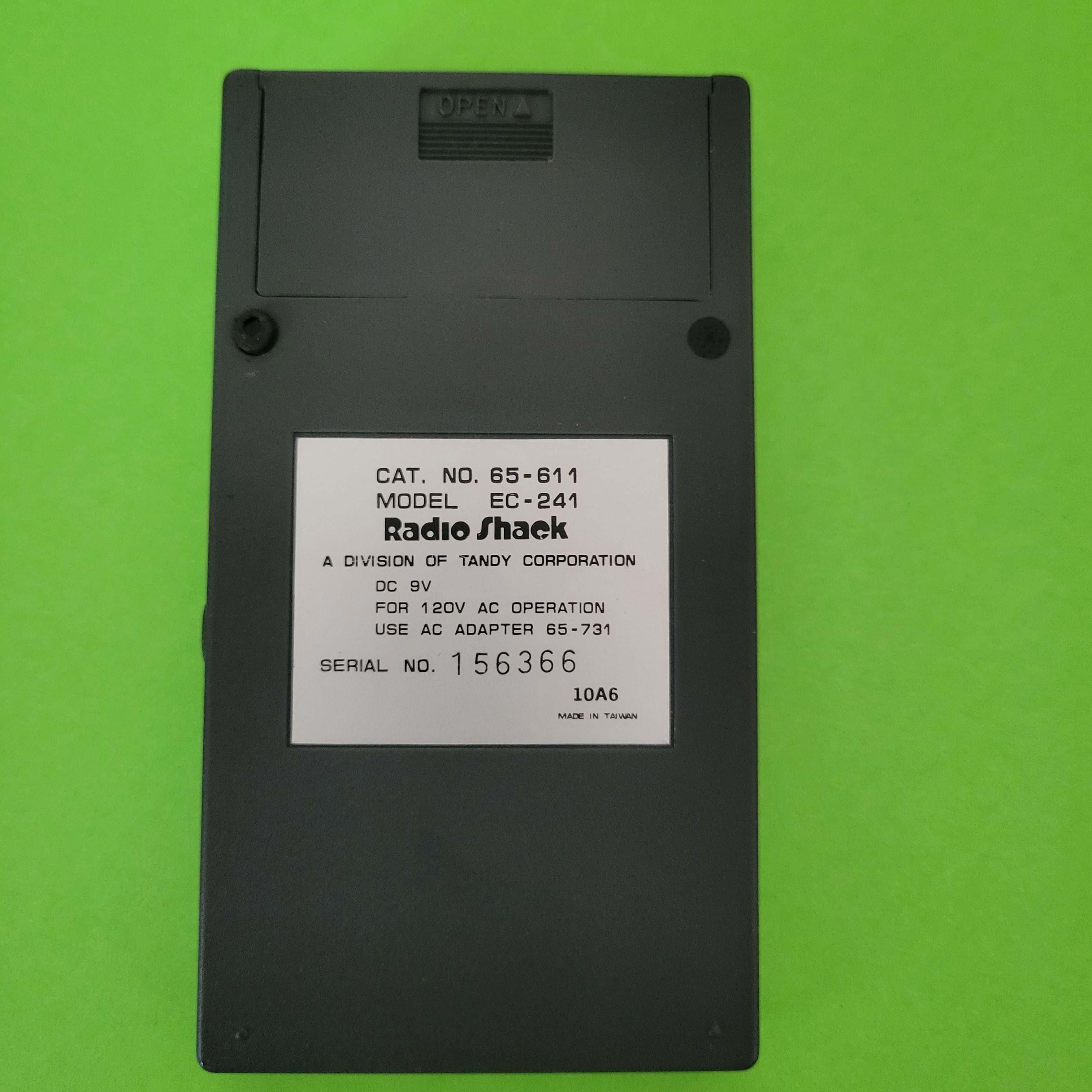 An image of the back of a Radio Shack EC-241 Four Function plus calculator